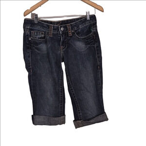 "BeBe Denim Jean Capris with Brown Studs"